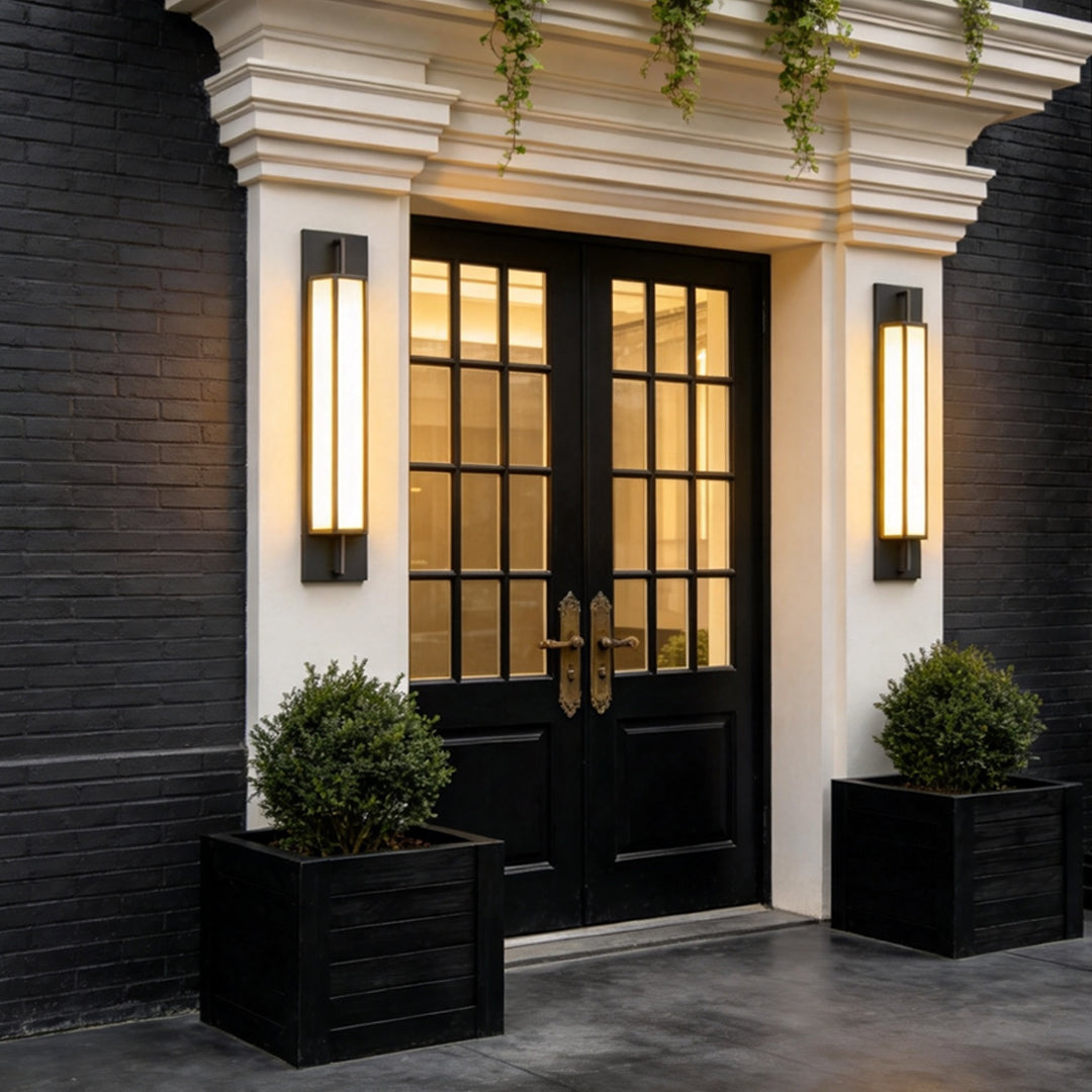 Elegant exterior doorway featuring contemporary Large Outdoor Wall Light fixtures beside black double doors at dusk.