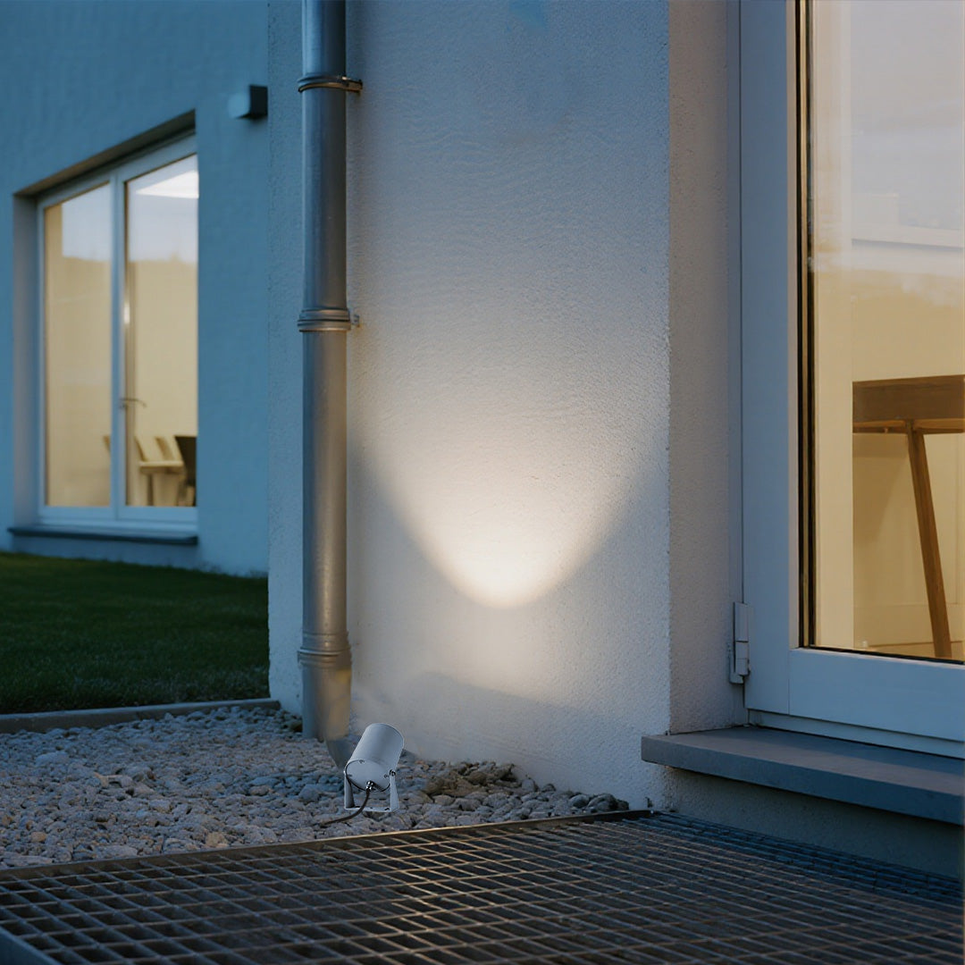Contemporary LED landscape spotlight creating elegant illumination for modern home exterior