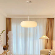 Contemporary led pendant lights installed in modern living room with neutral decor scheme