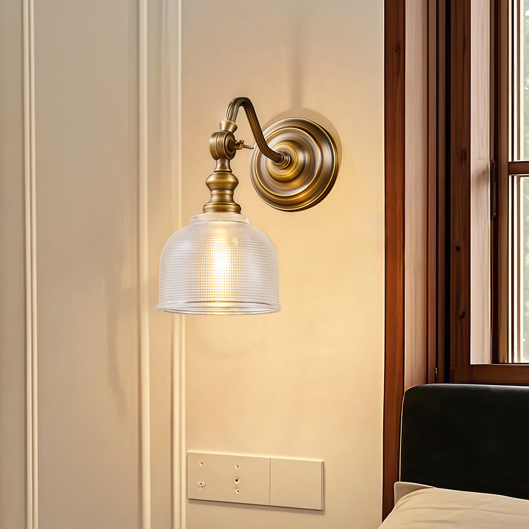 Contemporary LED wall light lamp with glass shade chandelier aesthetic providing warm hallway illumination with clear glass shade.