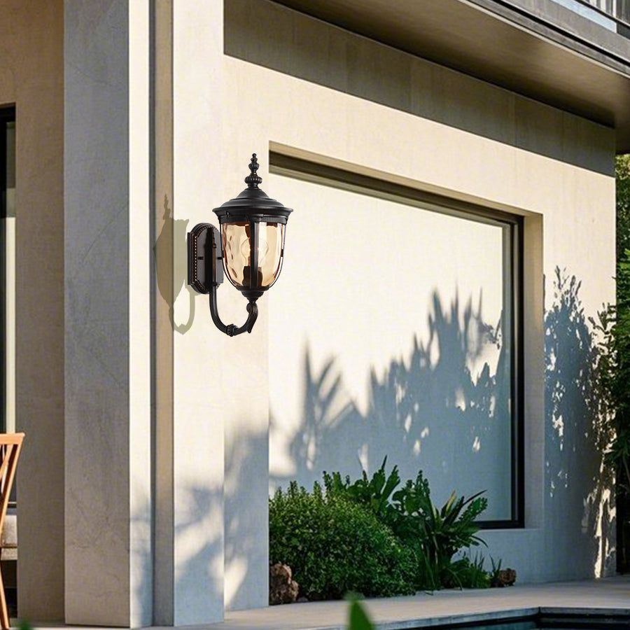 Contemporary outdoor lighting fixture installed on modern residential building entrance