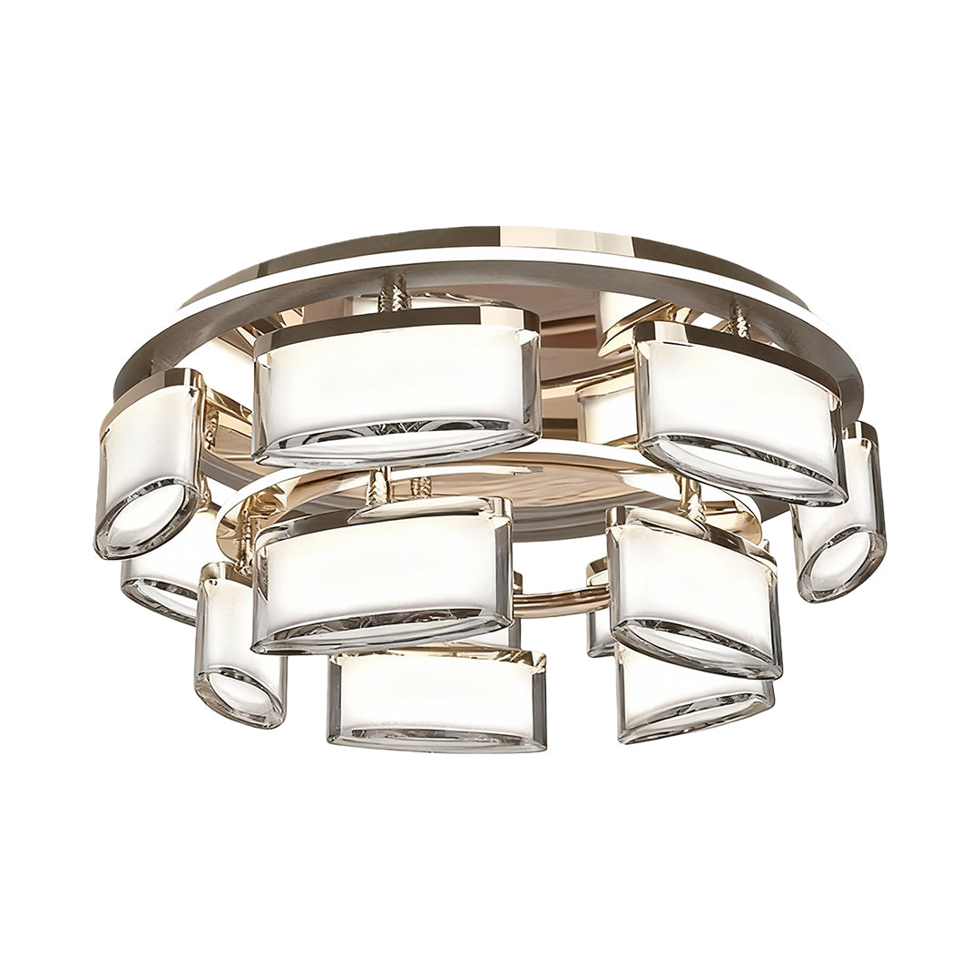 Contemporary linear suspension lighting displaying ring design with geometric glass elements and metallic gold hardware
