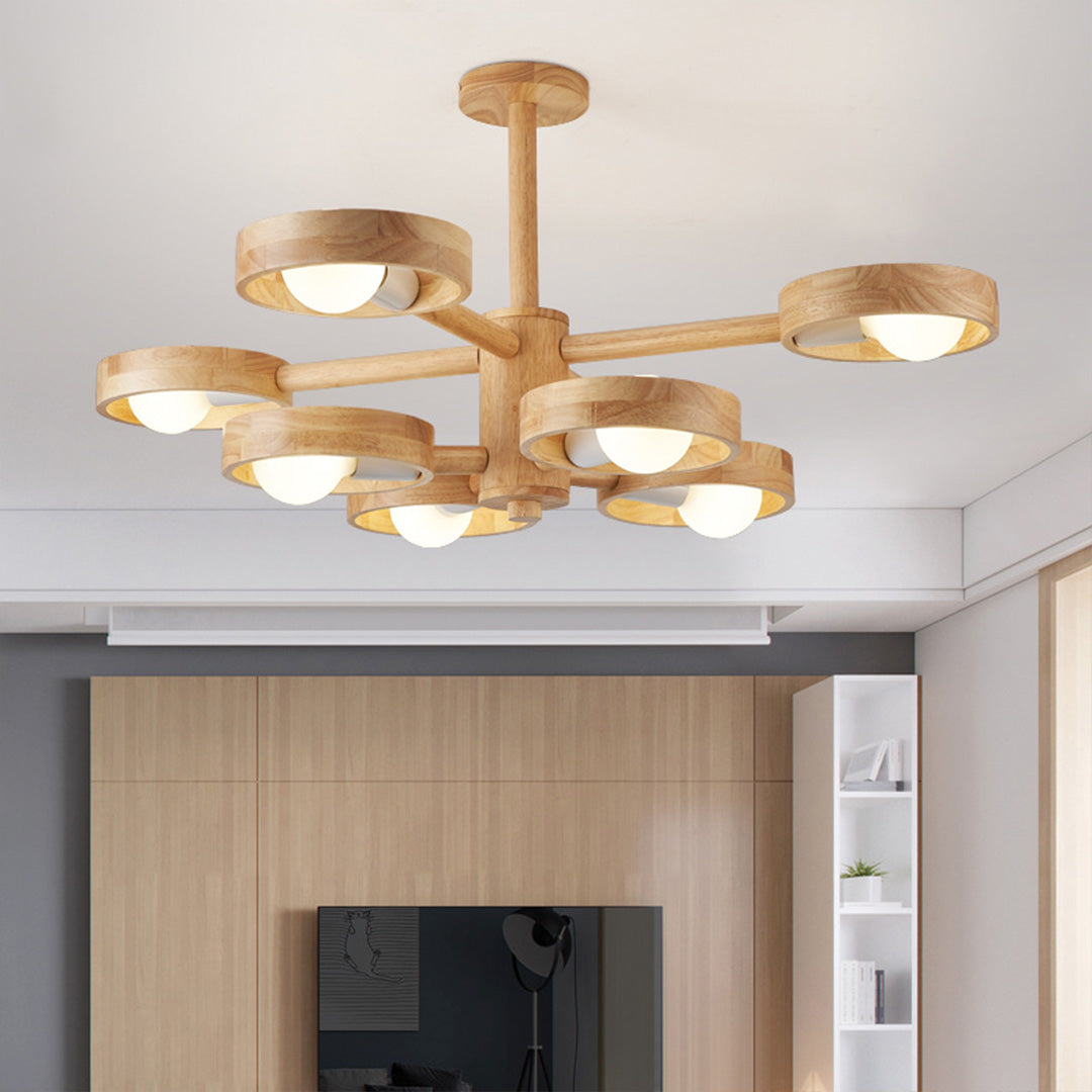 Installed brass glass shade chandelier in contemporary living room with wall light ambiance