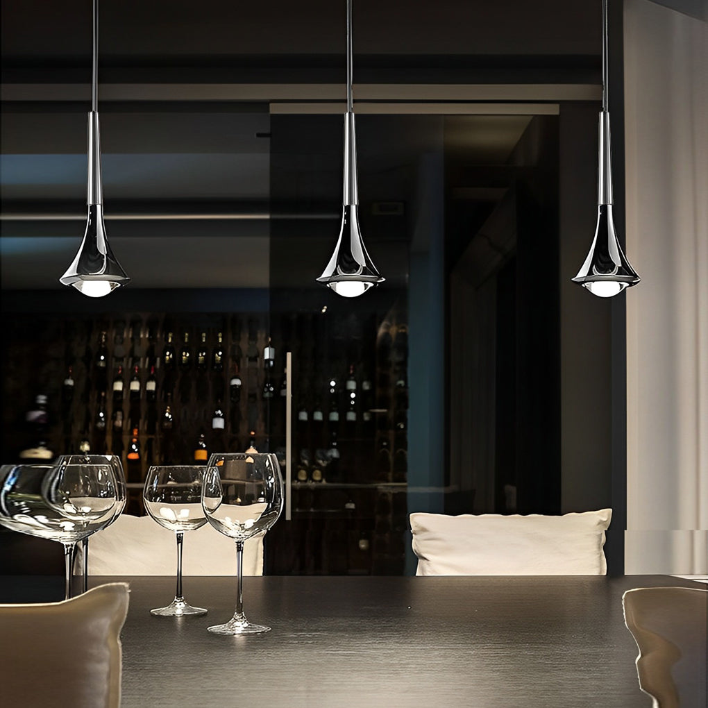 Contemporary mini pendant lights suspended above a bar counter, adding focused illumination and upscale modern style.