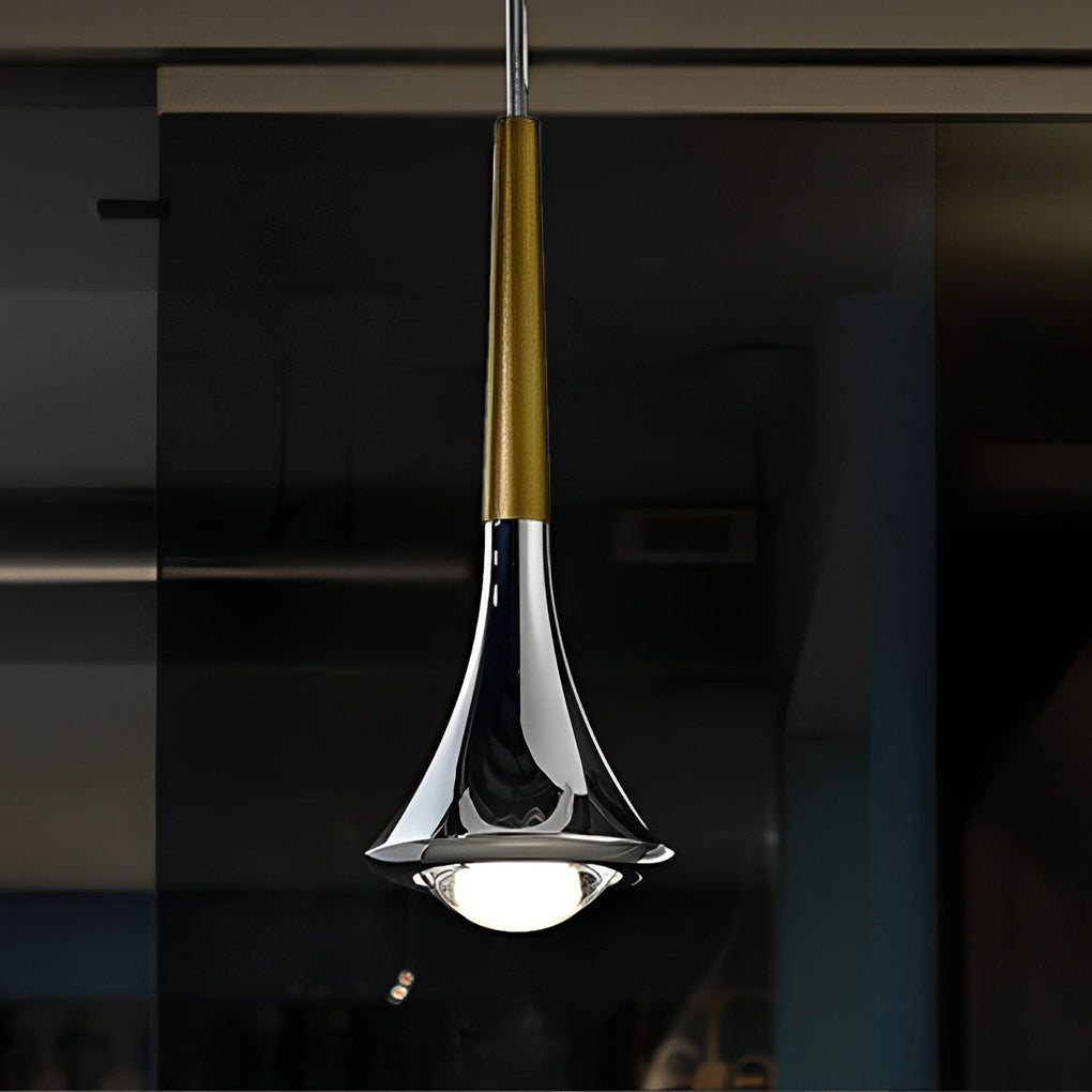 Contemporary mini pendant lights with elongated drop shape, showcased against a dark background for dramatic contrast.