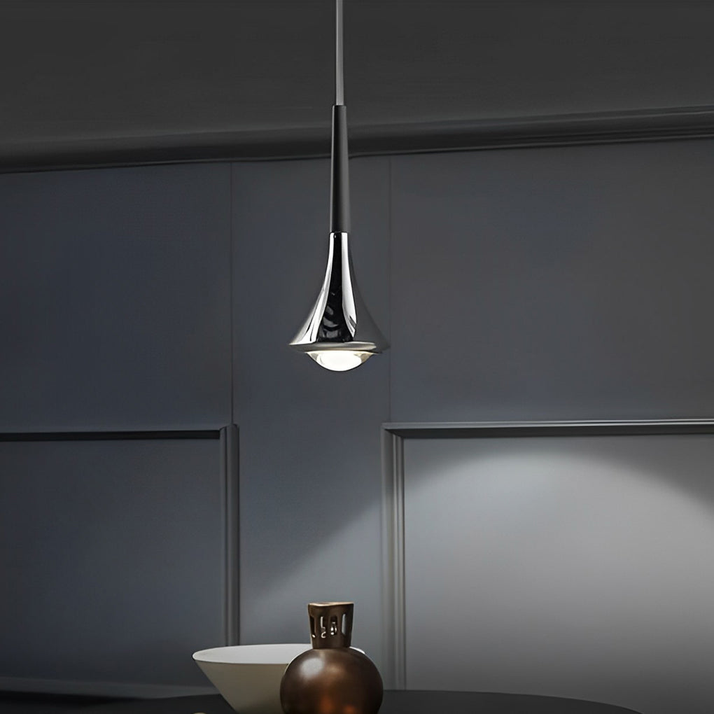 Single contemporary mini pendant light hanging in a minimalist space, highlighting its sculptural metallic form.