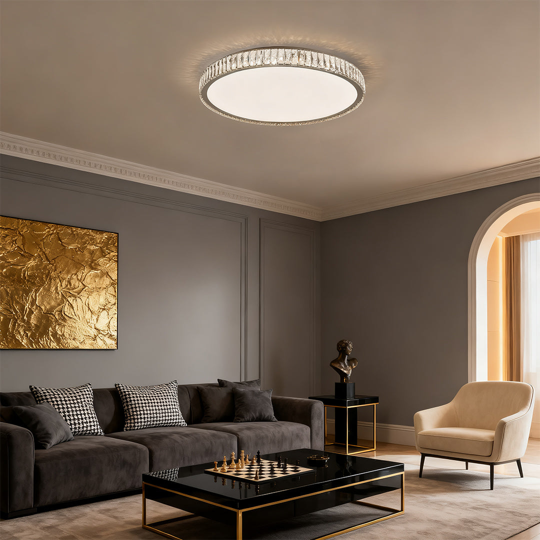 Contemporary modern crystal flush mount lighting fixture lighting up a minimalist living room space.