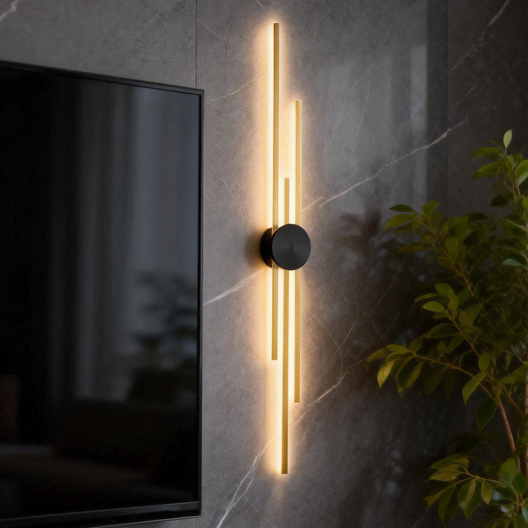 Contemporary modern linear wall sconce with a minimalist design and a round center fixture, perfect for adding style to any room.