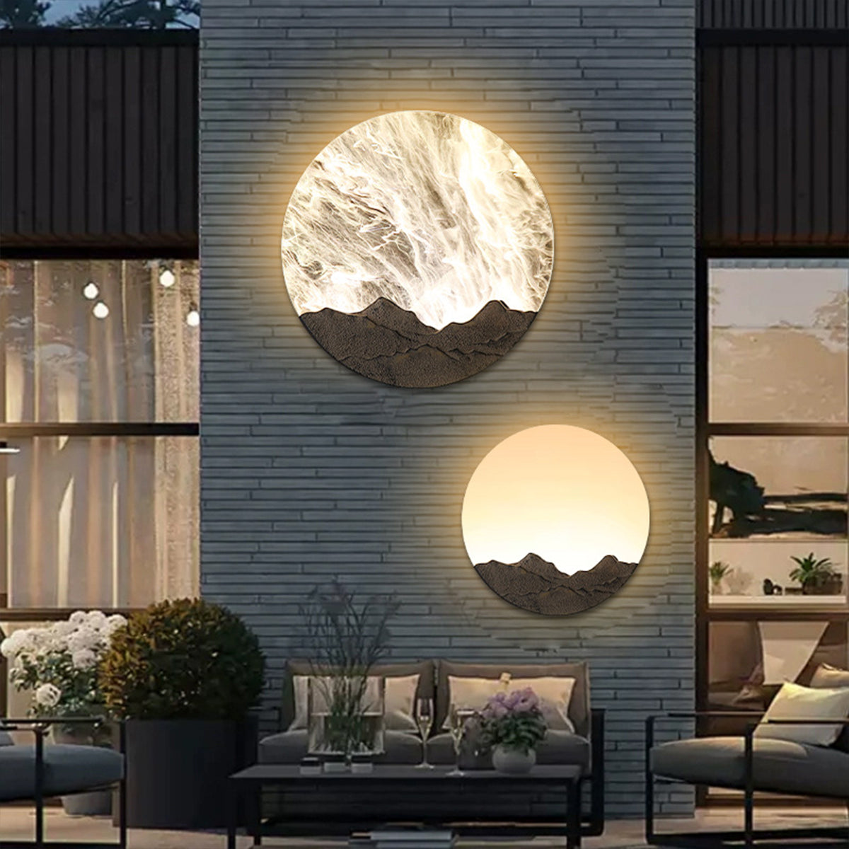 Contemporary living room featuring large circular wall art light with mountain landscape design