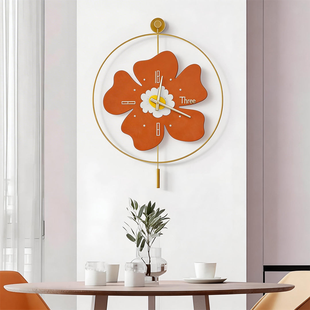 Contemporary orange wall clock with light as a focal point in a minimalist living room.