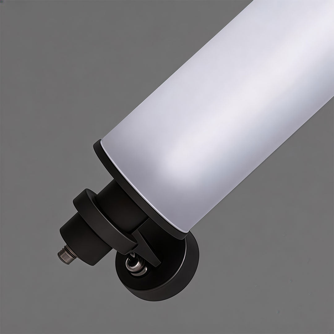 Close-up of contemporary outdoor LED wall lights showcasing its cylindrical shape and warm light.