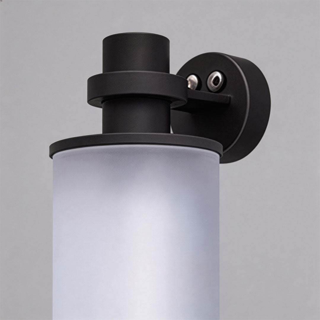 Contemporary outdoor LED wall lights with a cylindrical design, providing warm illumination.