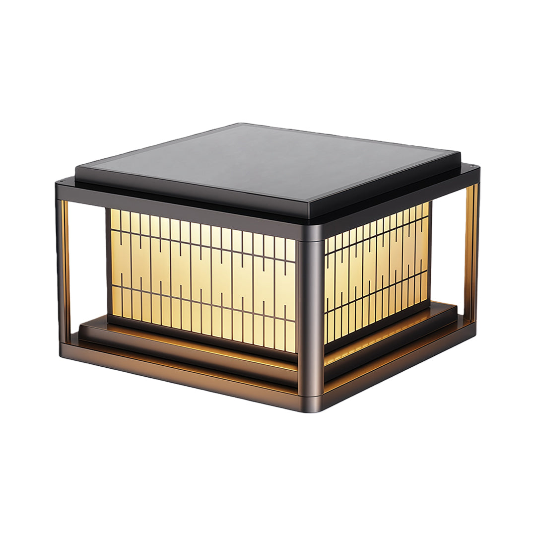 Contemporary outdoor pillar LED light featuring geometric pattern with amber glass and dark frame.