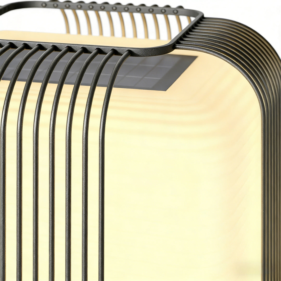 Contemporary outdoor pillar lights with a modern design, providing soft illumination near a water feature.