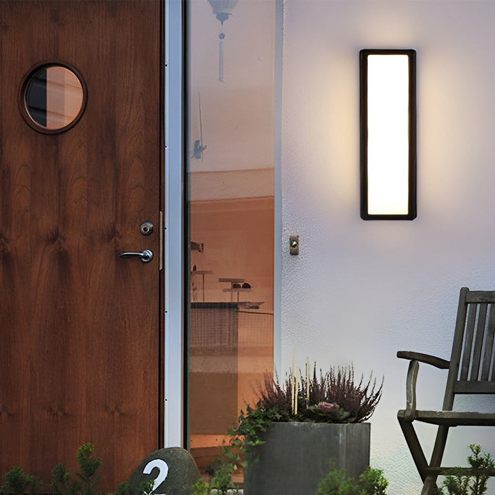 Contemporary outdoor wall light installed near doorway