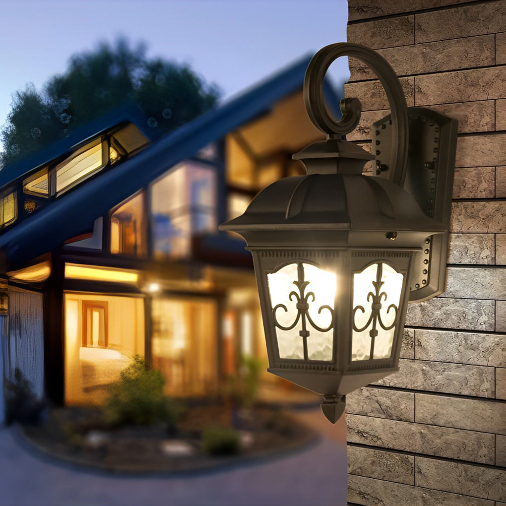 Contemporary outdoor wall light installed near a front entry with warm evening lighting.