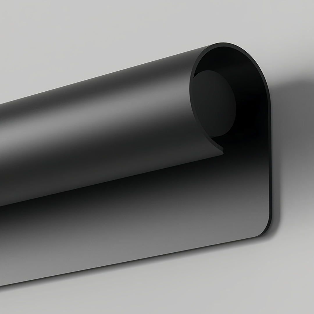 Contemporary outdoor wall lighting copper sconce detail showing curved black tube design with downward light emission