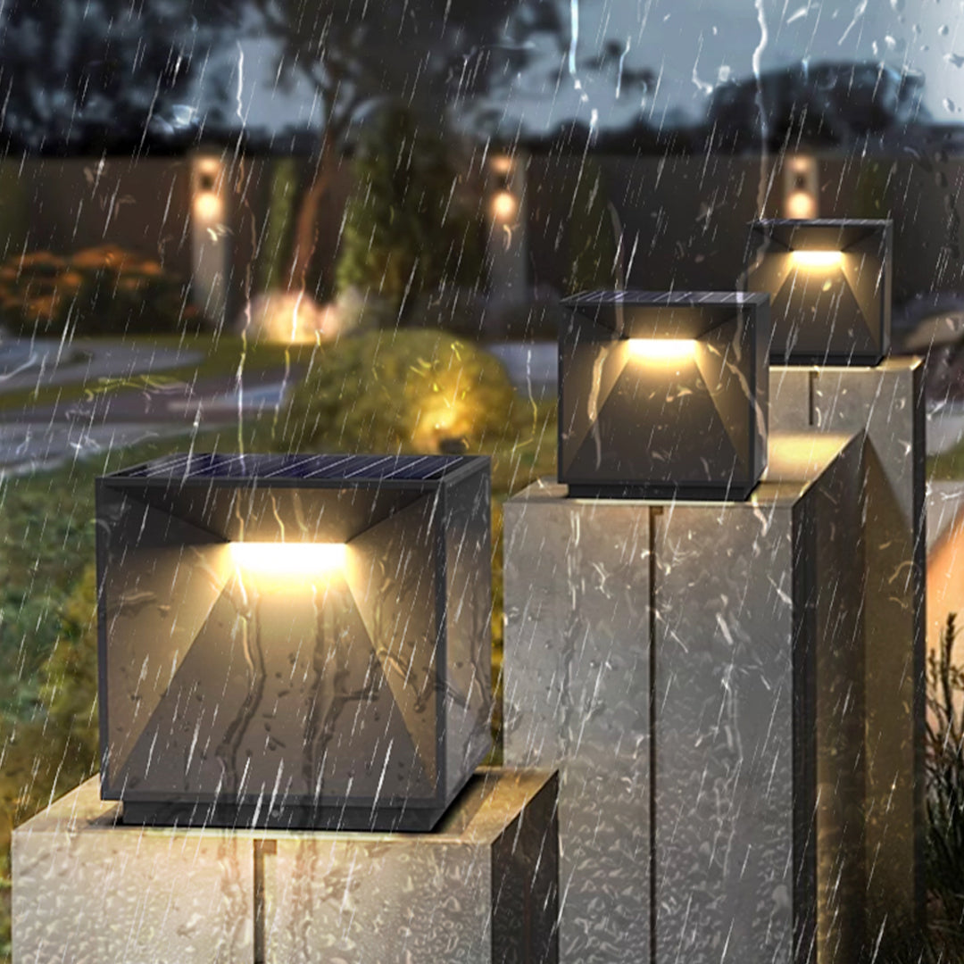 Contemporary outdoor wall lighting garden pillar light in sleek black cube design with angular modern aesthetic