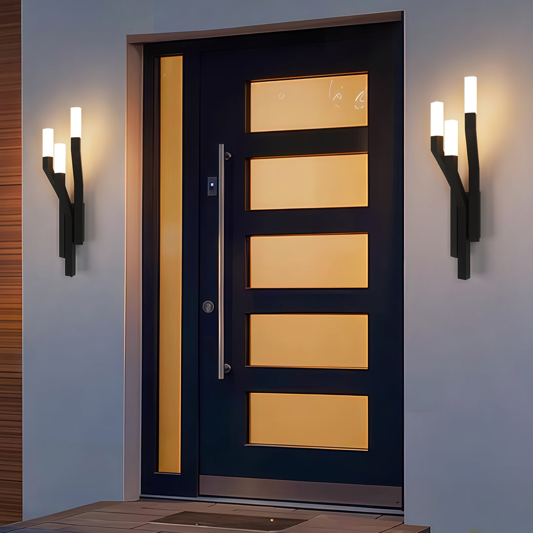 Contemporary outdoor wall lighting large fixtures flanking modern black front door with horizontal glass panels