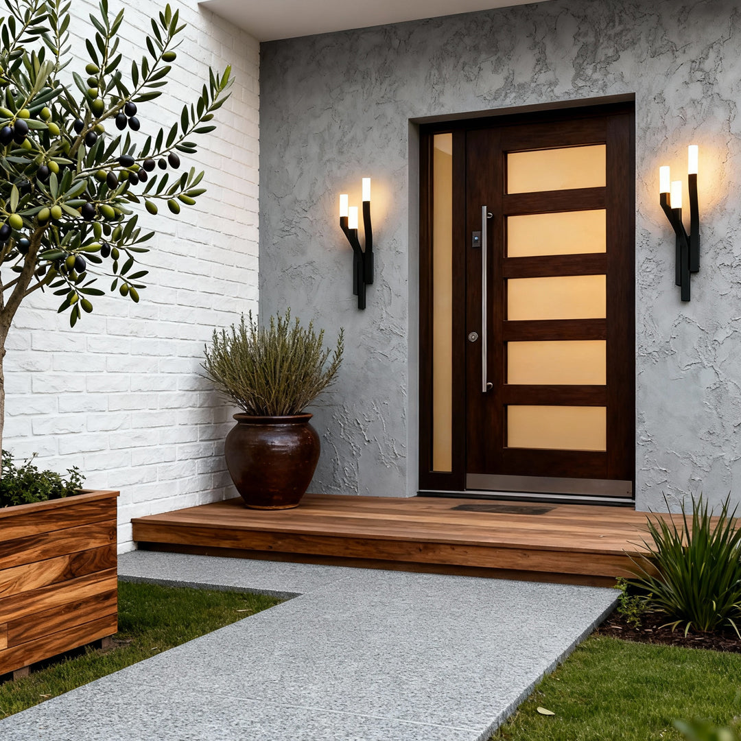 Contemporary outdoor wall lighting large fixtures flanking modern wooden door on white textured exterior wall