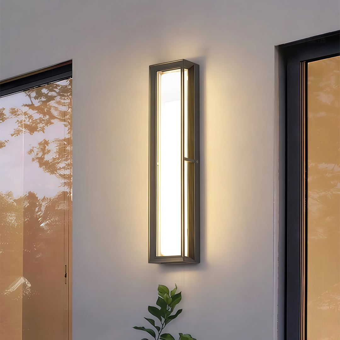 Contemporary outdoor wall lighting wall mounted linear light creating warm accent on modern gray interior hallway wall