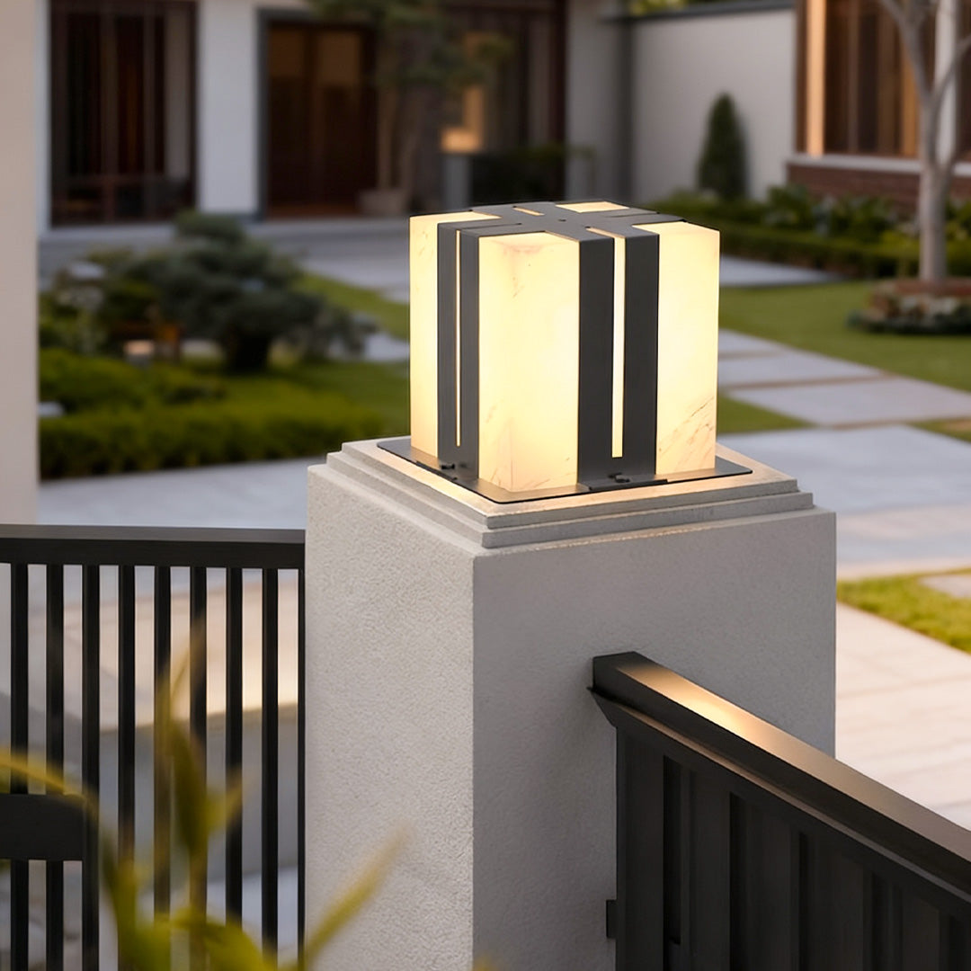 Contemporary outdoor wall lighting pillar LED light mounted on stone column beside residential entrance