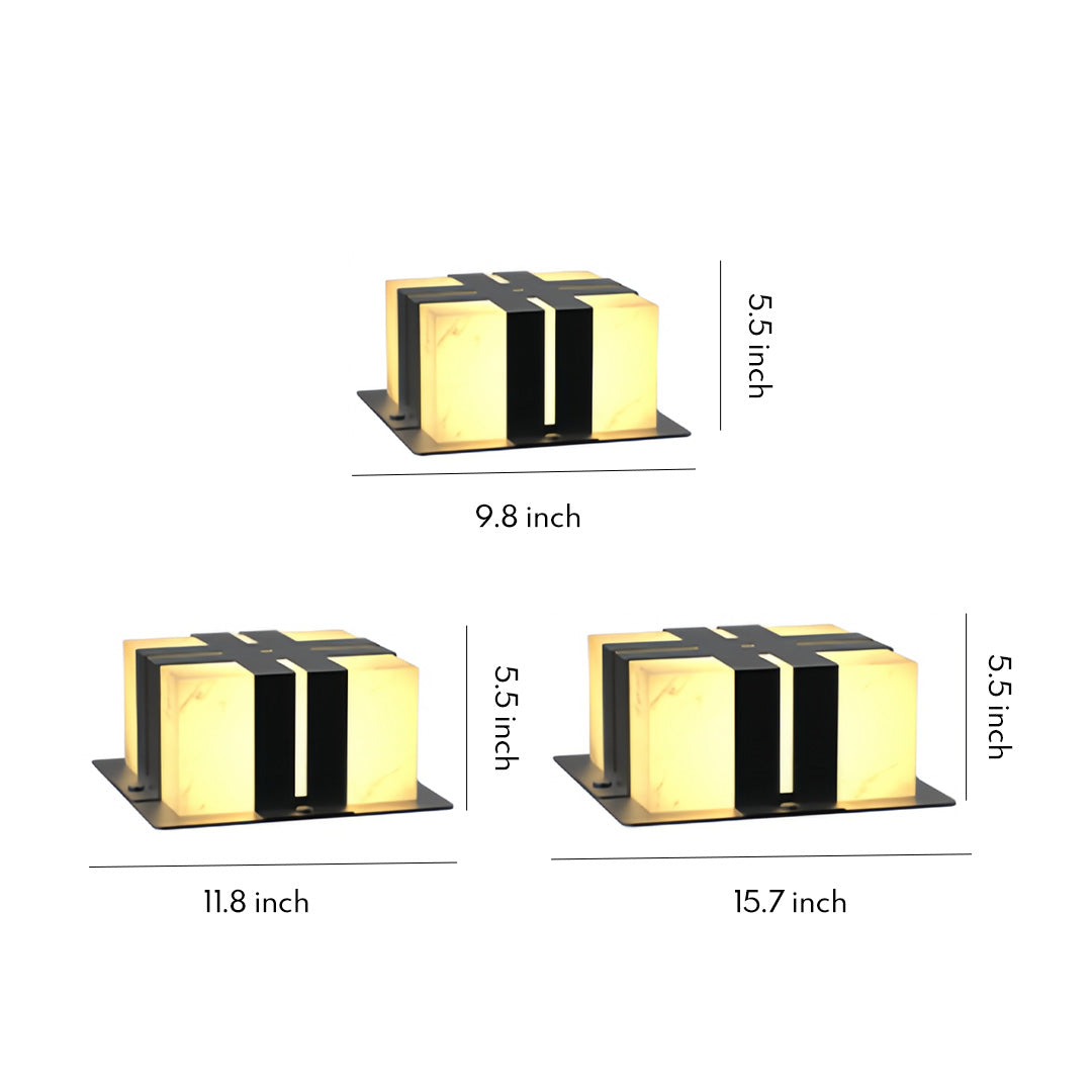 Contemporary outdoor wall lighting pillar LED lights in various sizes with black and gold finish on white background