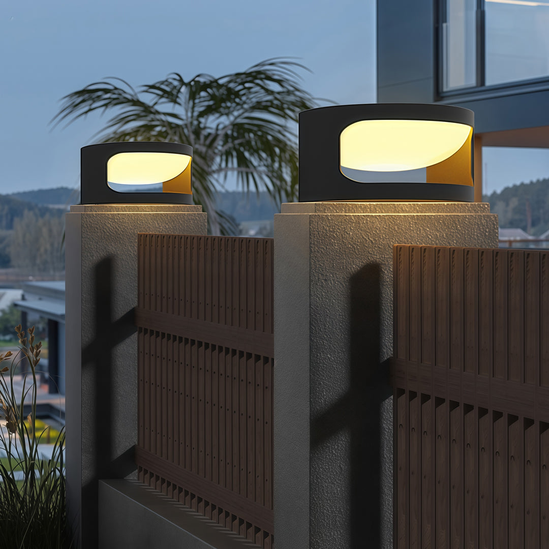 Contemporary outdoor wall lighting pillar top fixtures on contemporary pillars with dramatic blue hour lighting