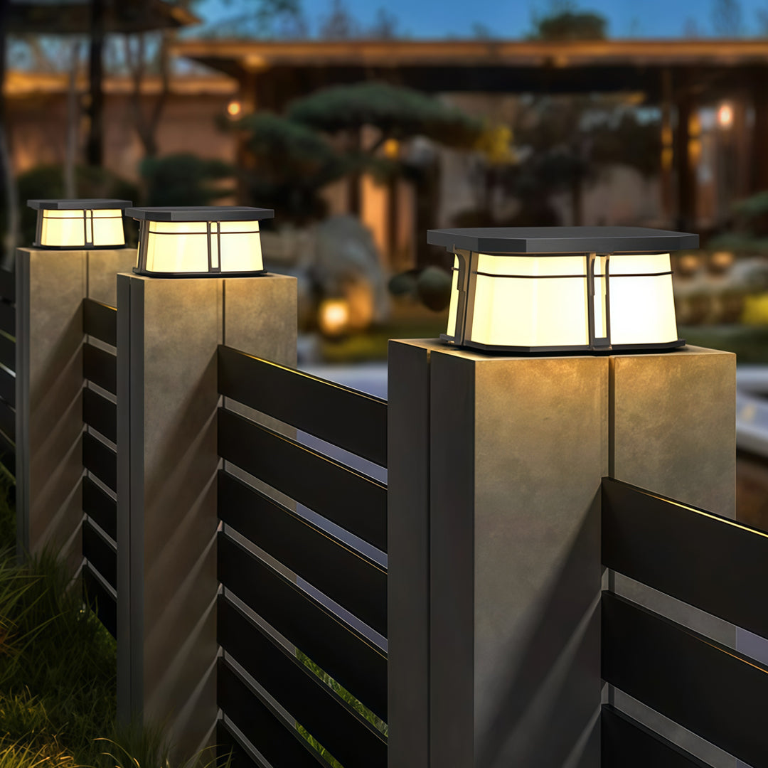Contemporary outdoor wall lighting pillar top fixtures on contemporary gray pillars with evening outdoor setting