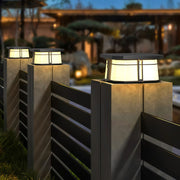 Contemporary outdoor wall lighting pillar top fixtures on contemporary gray pillars with evening outdoor setting