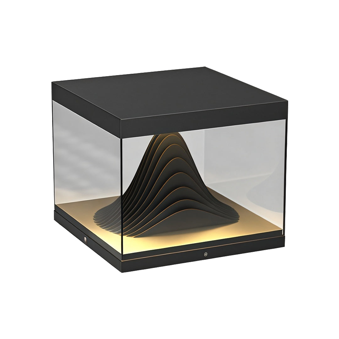 Contemporary outdoor wall lighting pillar fixture with transparent chamber showcasing sculptural pyramid light form