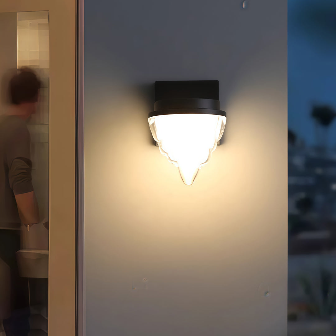 Contemporary outdoor wall lighting square wall sconce illuminating modern interior corner with warm ambient glow