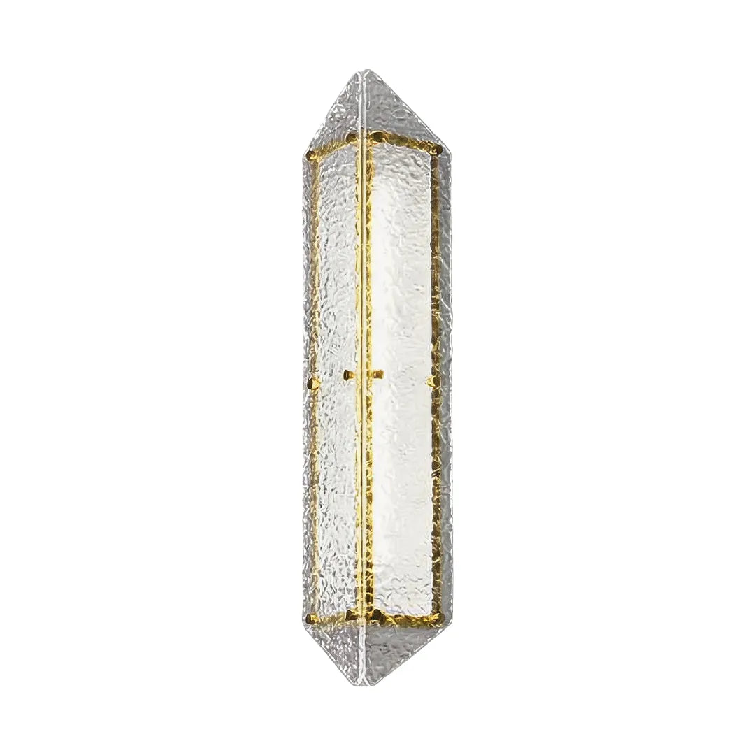 Contemporary outdoor wall sconce with gold metal accents and warm glass shade