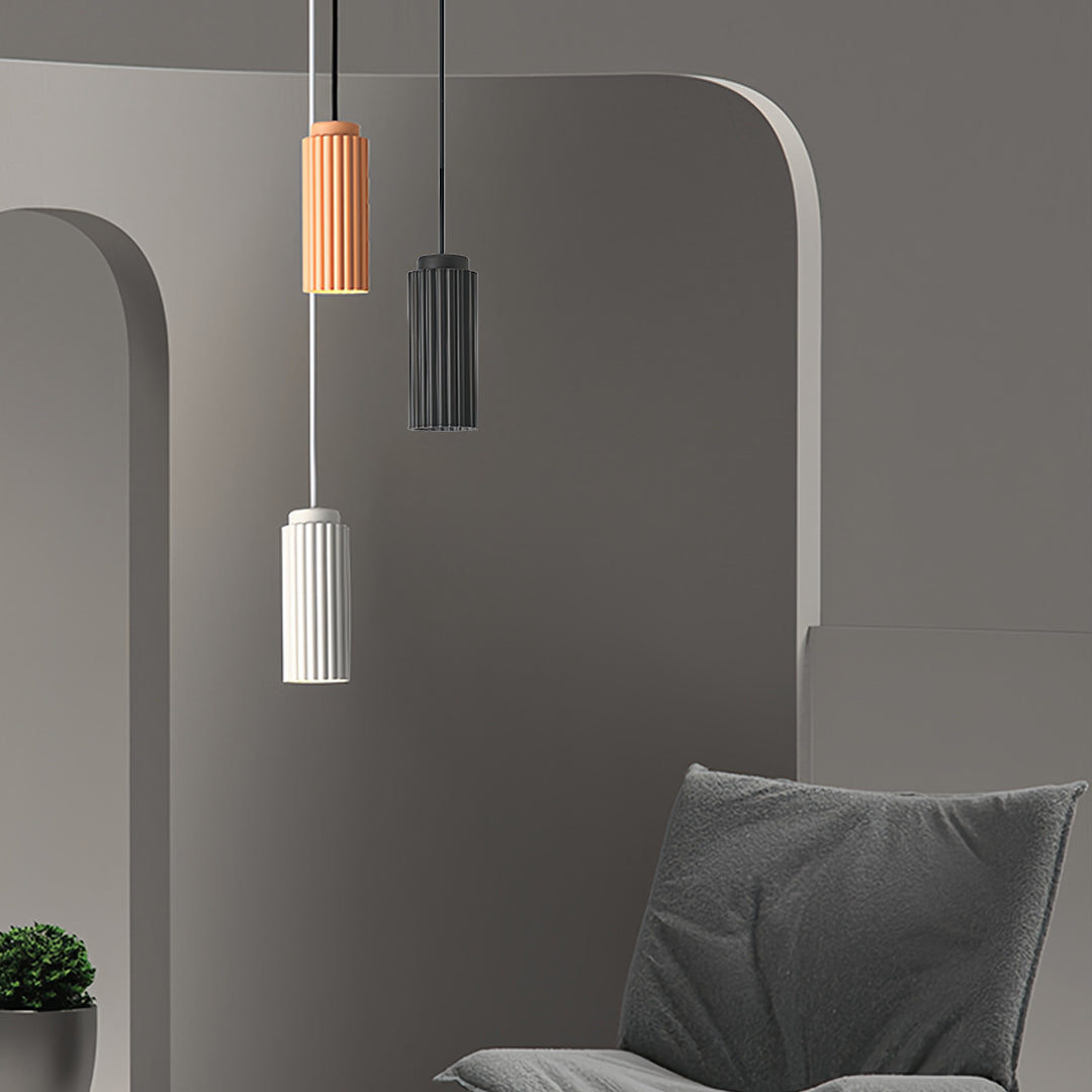 Contemporary metal pendants light creating ambient lighting in modern living room