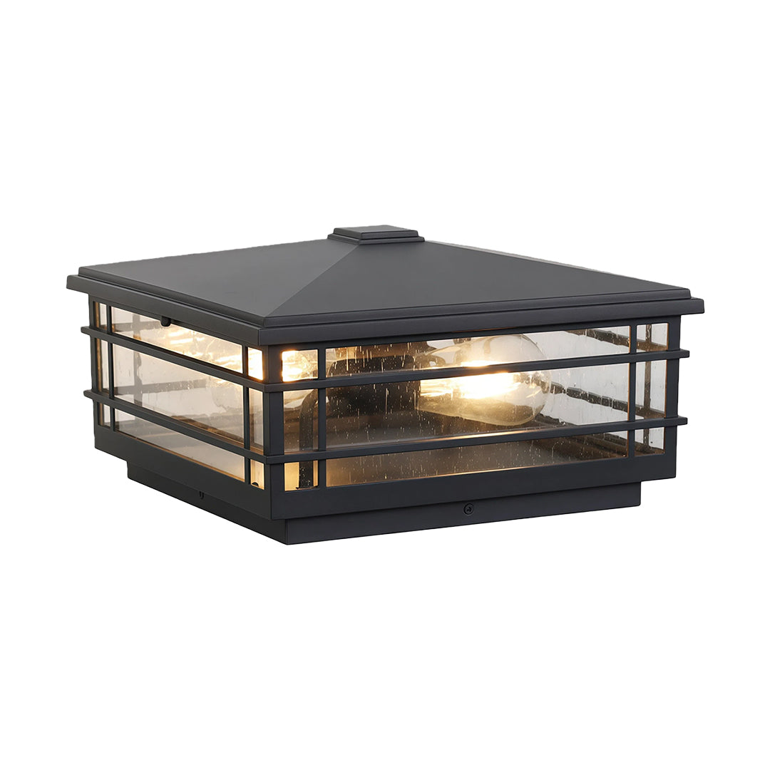 Contemporary pillar lights outdoor design featuring layered geometric frame and warm ambient lighting