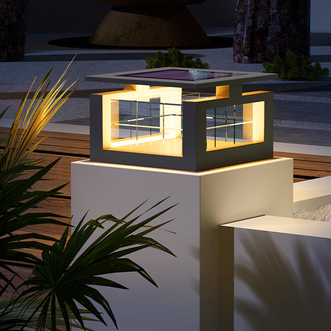 Sleek contemporary post light with rectangular design providing ambient illumination for modern outdoor seating area