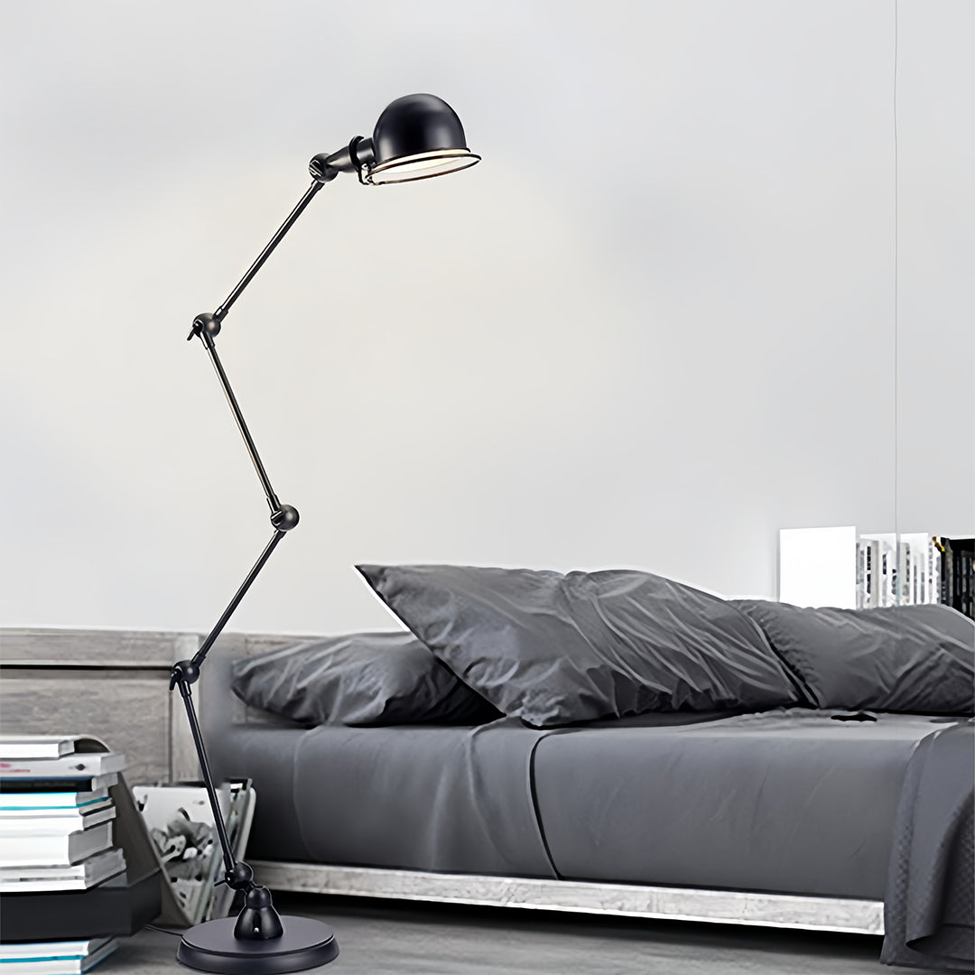 Contemporary reading floor lamp for living room with adjustable black head beside modern gray bedding