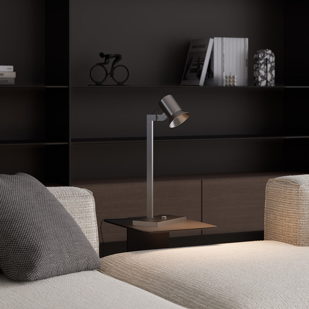 Contemporary reading swing arm desk lamps on nightstand in modern dark-toned bedroom.