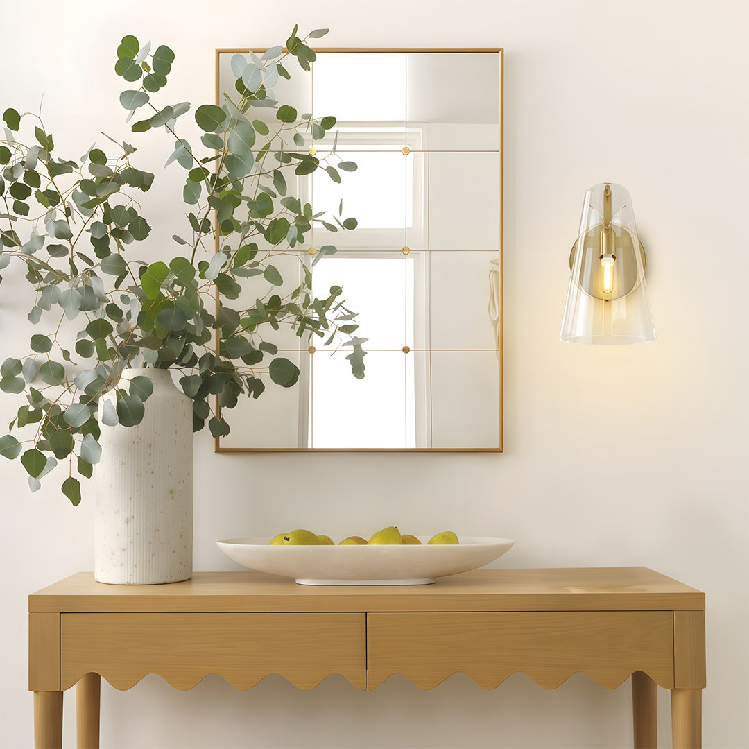 Modern luxury chandeliers inspired contemporary wall sconce lighting above console with plants and artwork