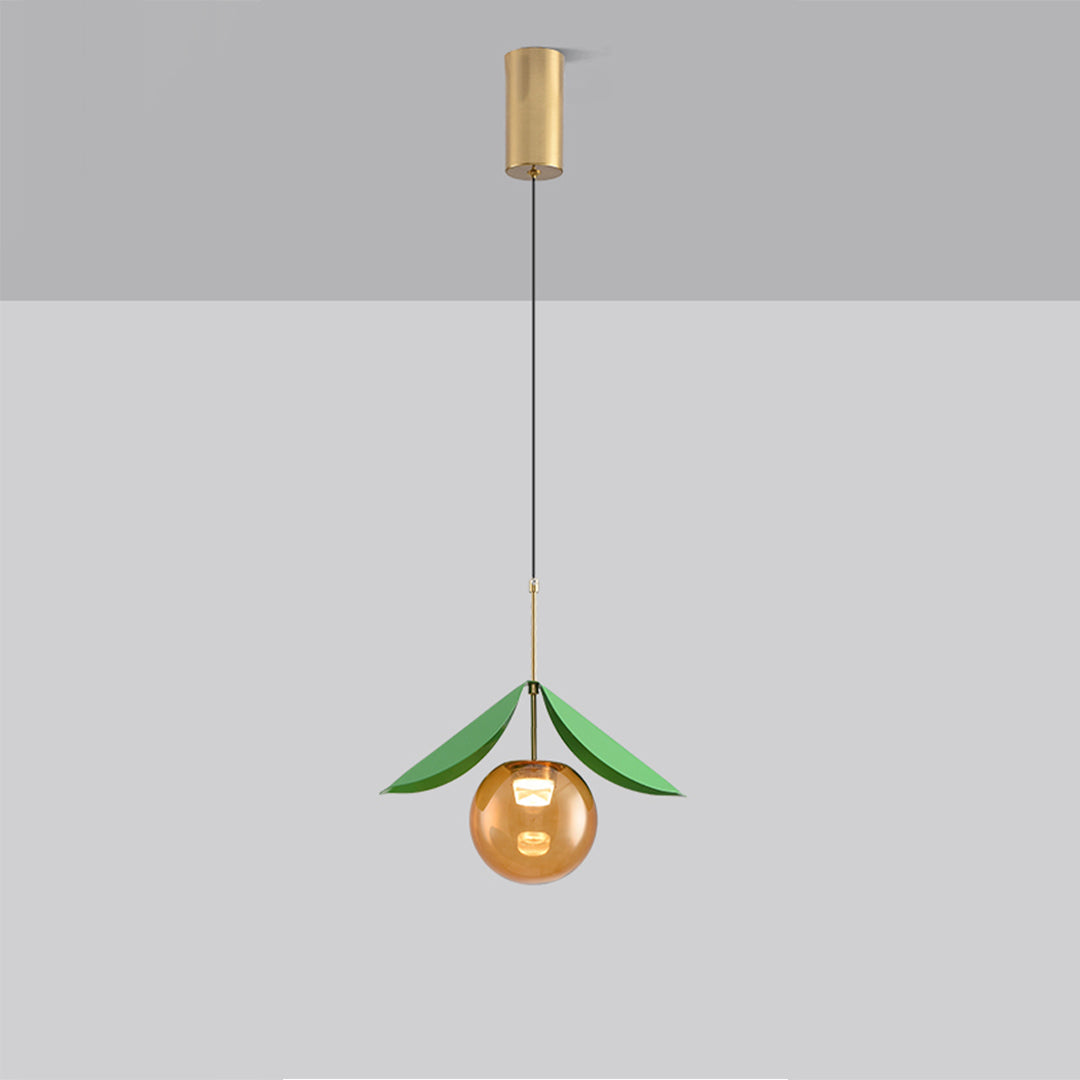 Contemporary glass globe pendant light fixture with single green shade and brass hardware