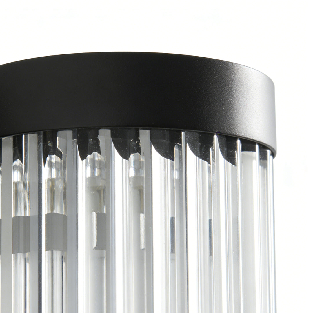 Contemporary outdoor wall LED light featuring multiple vertical tubes and black frame, ideal for stylish and efficient outdoor illumination.