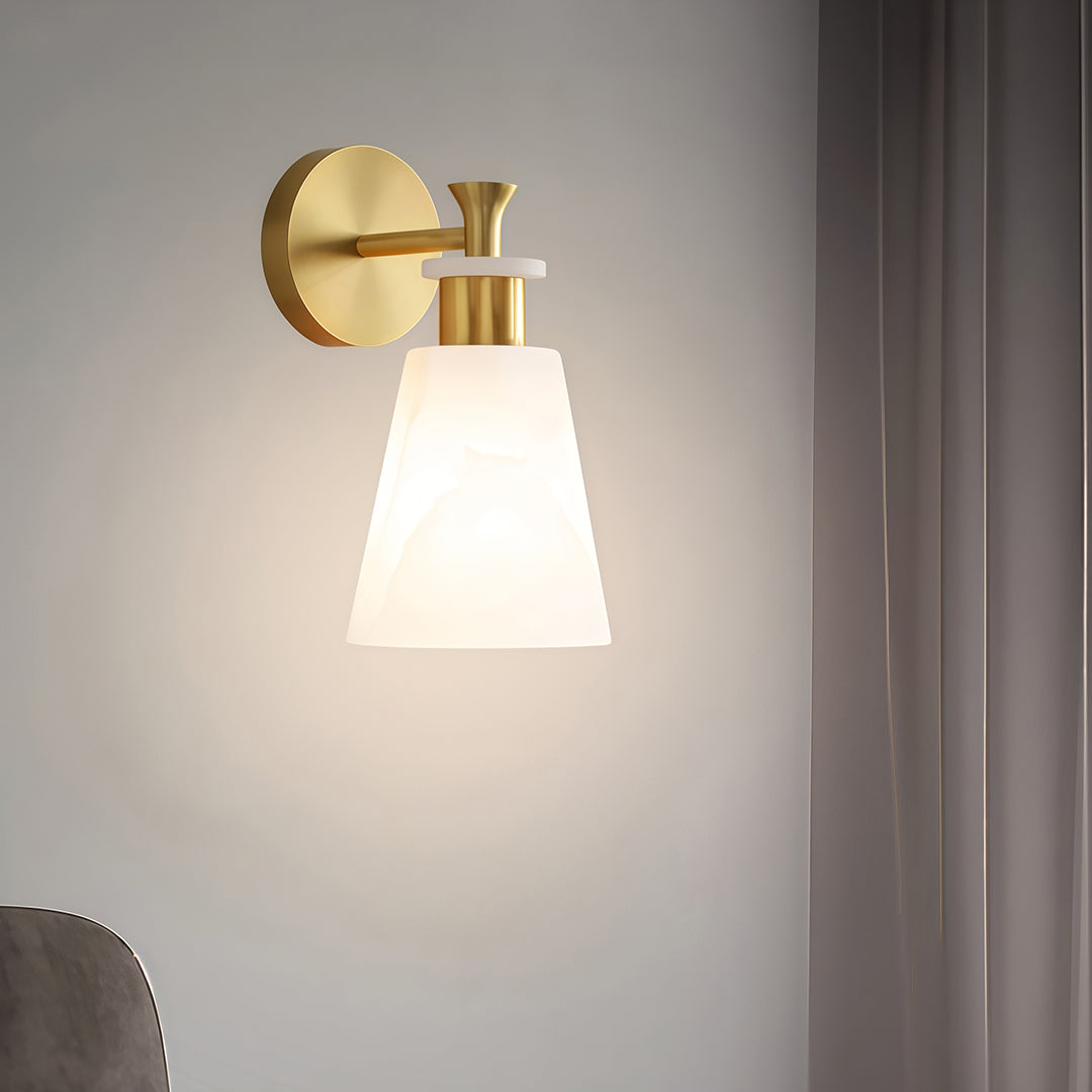Contemporary wall sconce LED light with glass shade chandelier styling illuminating modern gray interior with soft directional glow.