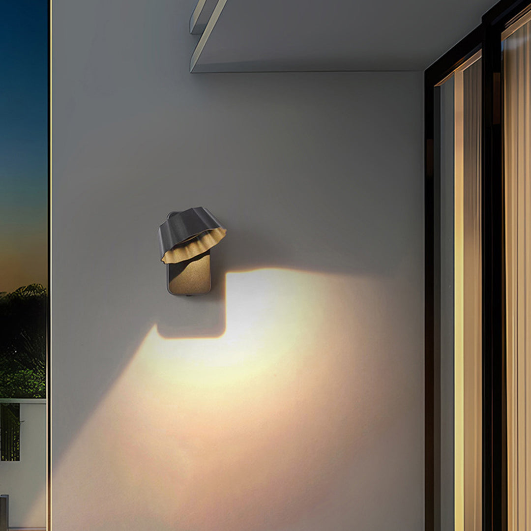 Contemporary wall sconce in minimalist hallway interior with clean architectural lines