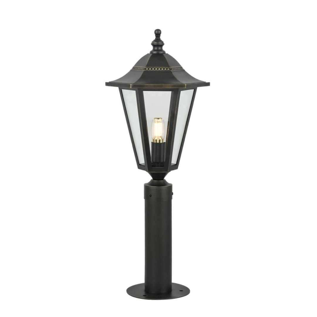 Traditional copper landscape path lights featuring a tall post and clear glass panels for elegant outdoor pathway lighting.