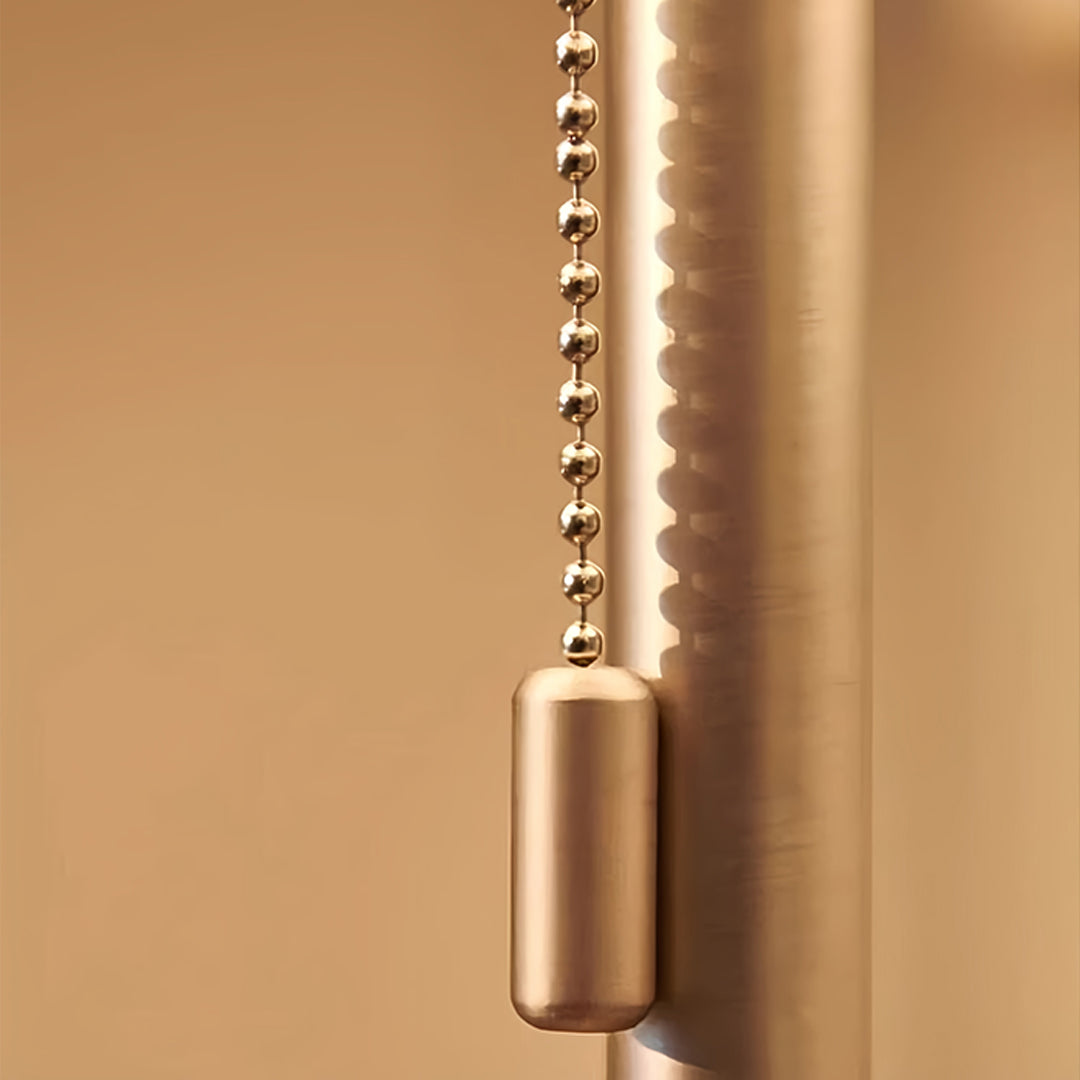 Copper-finished LED floor lamp adding metallic accent to warm interior design