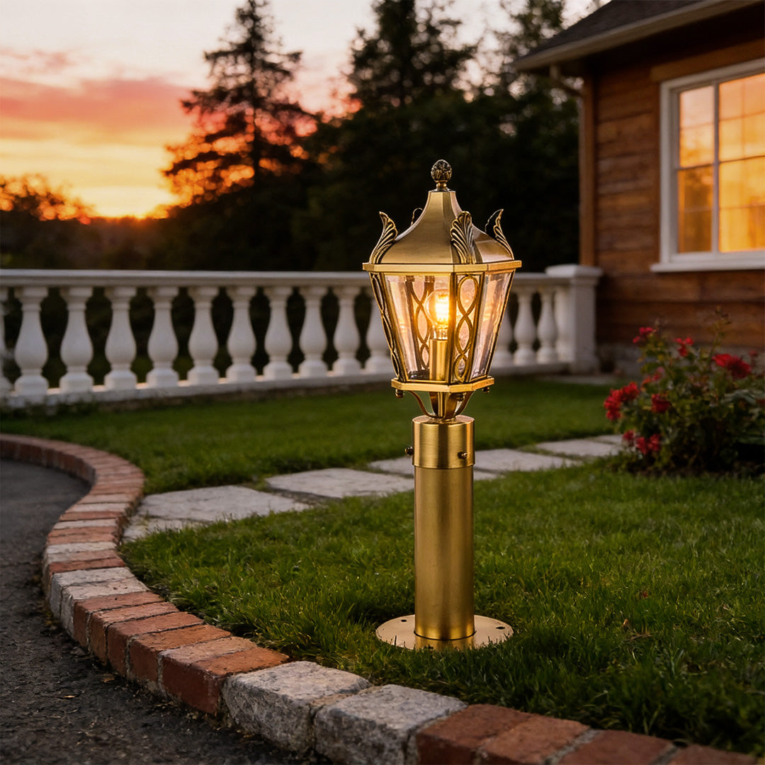 Charming copper outdoor path lighting illuminating a cobblestone pathway, ideal for backyard and landscape lighting.