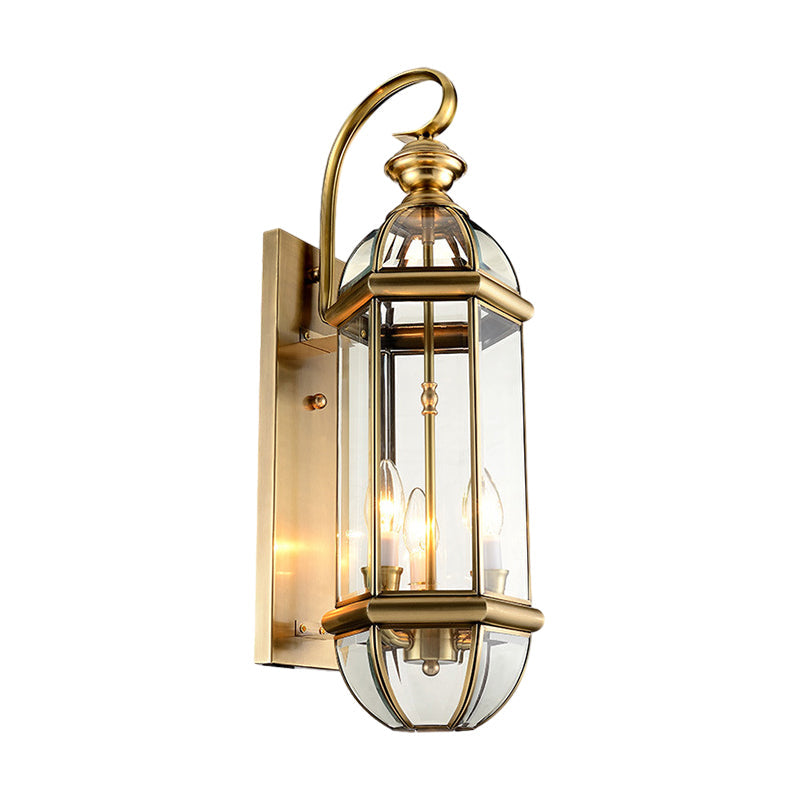 Copper outdoor wall sconce product image showing an antique copper lantern frame with clear glass panels and a decorative curved arm.
