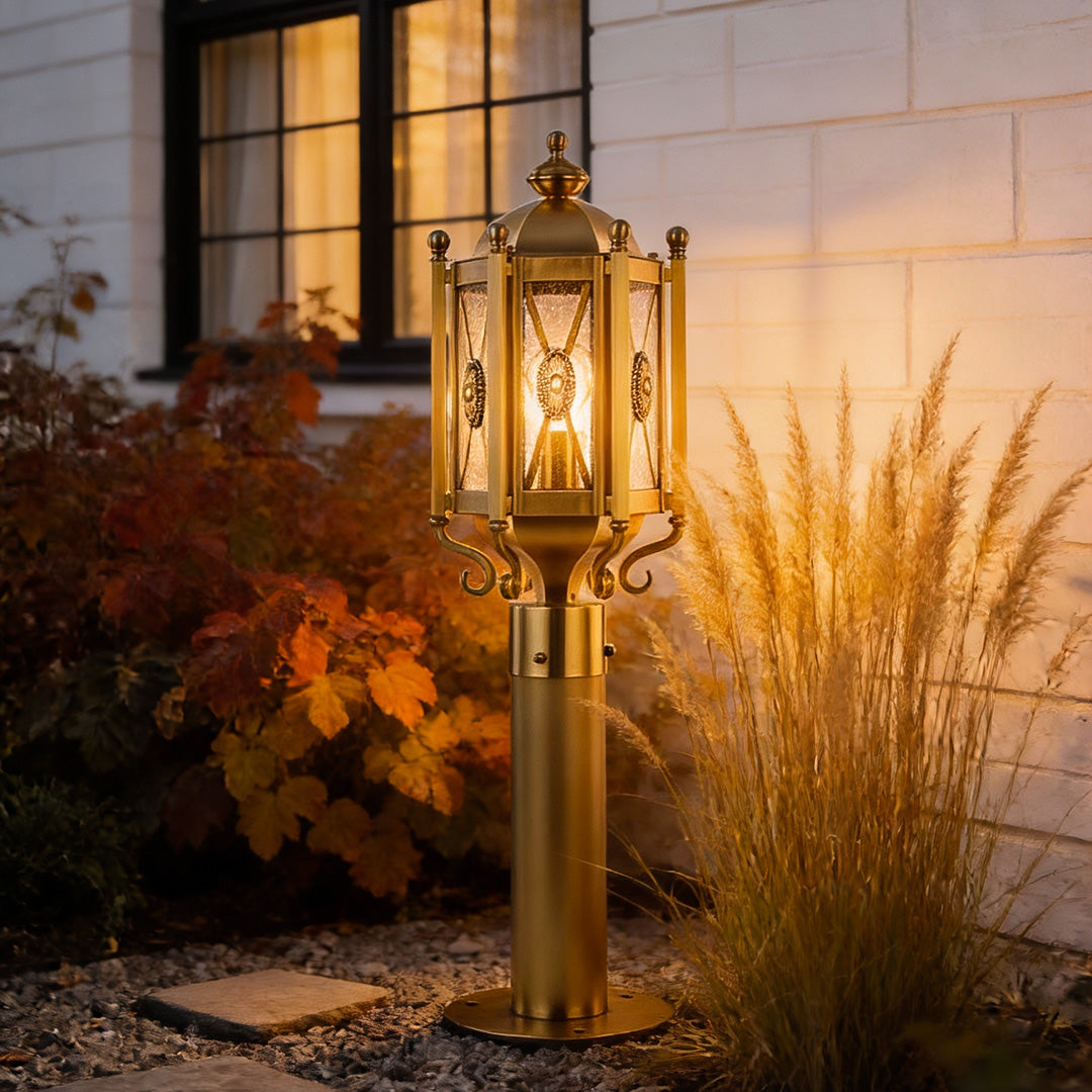 Beautiful copper path light enhancing the charm of a garden path, surrounded by lush plants and warm evening light.