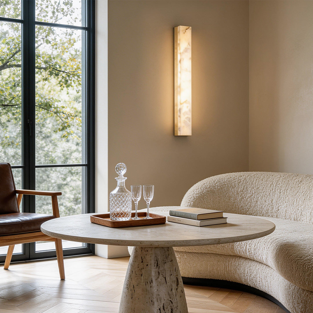 Copper sconce indoor enhancing a modern dining room with soft illumination.