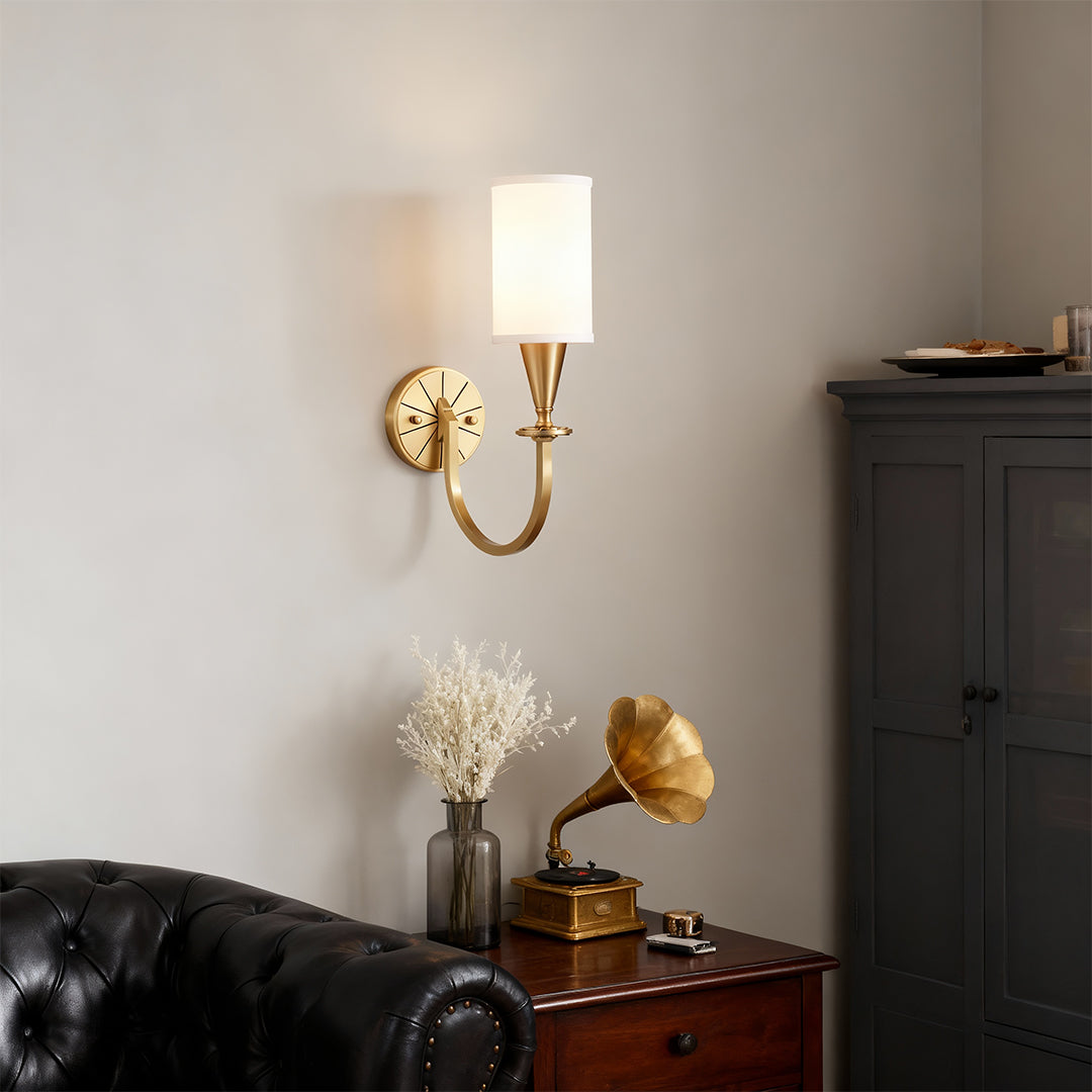 Modern luxury chandeliers inspired copper wall lights creating ambient glow above black headboard